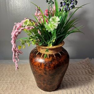 Beautiful handcrafted vintage wicker trimmed clay vase